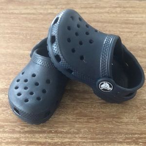 Never worn kids crocs. Size 4 in Navy